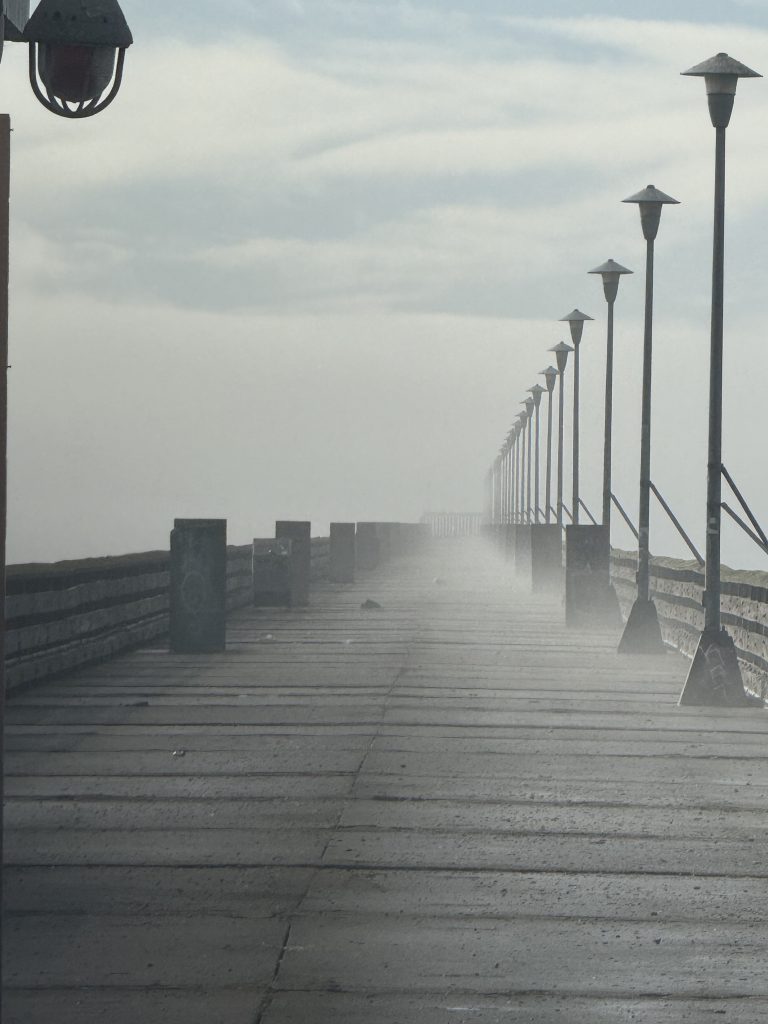 Foggy pier path representing spiritual discernment and navigating spiritual guidance