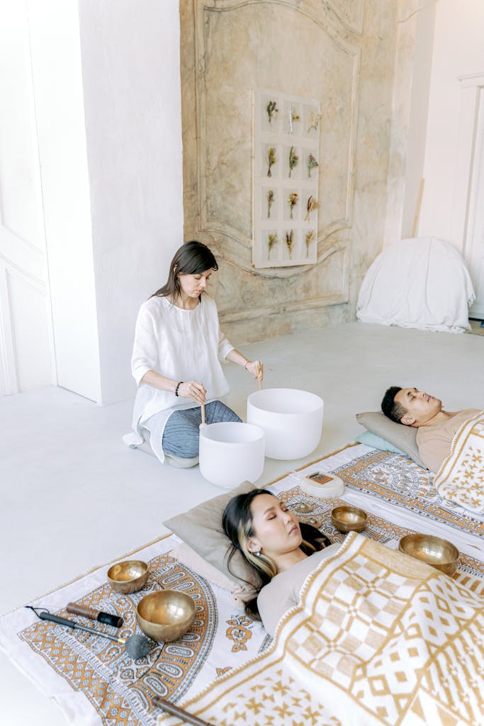 sound wave therapy benefits created through a calming sound bath session with singing bowls for relaxation and wellness.